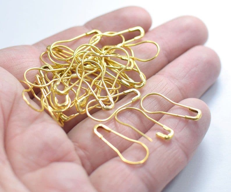 Silver and golden scarf pin