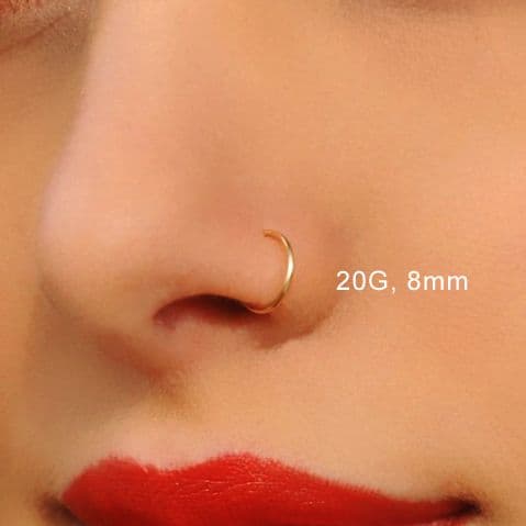 Golden nose pin