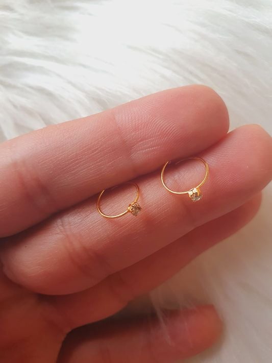 Golden nose pin stone