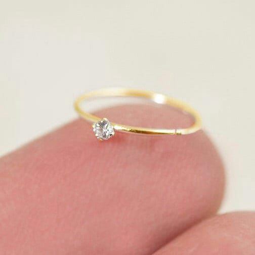Golden nose pin stone
