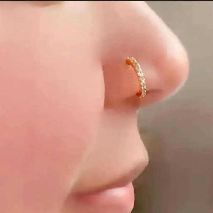 Golden nose pin stone