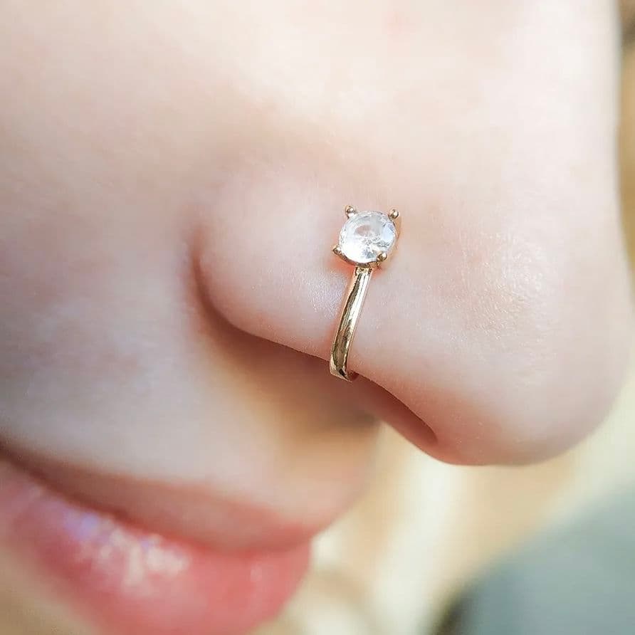 Golden nose pin stone