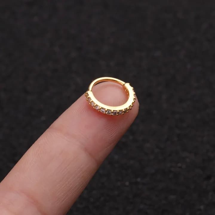 Silver and golden nose pin stone
